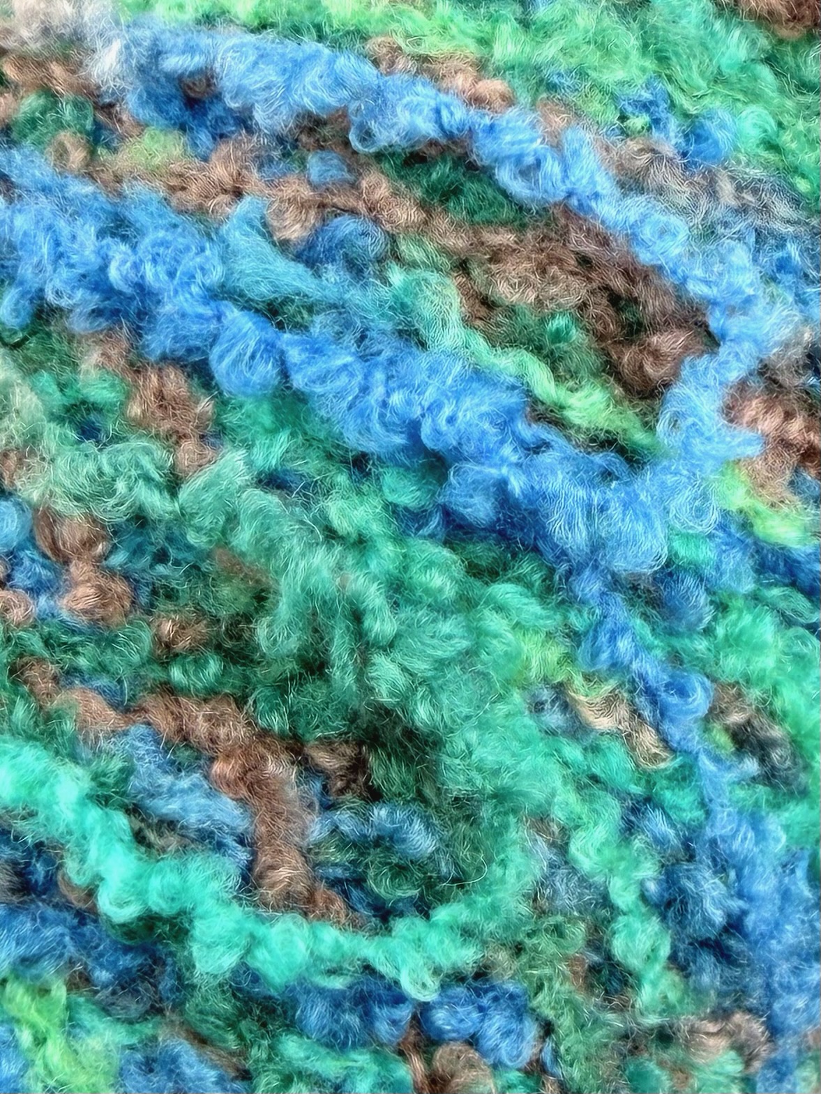 Corallo Bouclé 240m/100g – Lana Merino Extrafine e Seta con Elastan Melange Blu-Verde Pastello